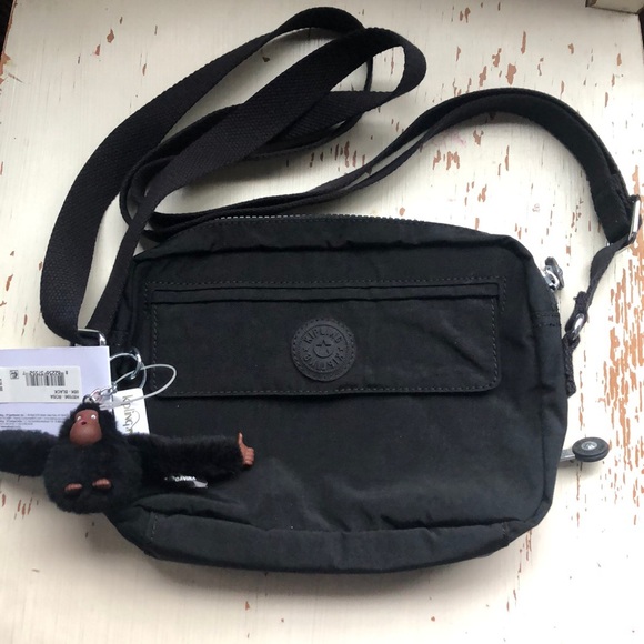 Kipling Handbags - NWT Kipling Rosa Crossbody bag and Monkey Keychain